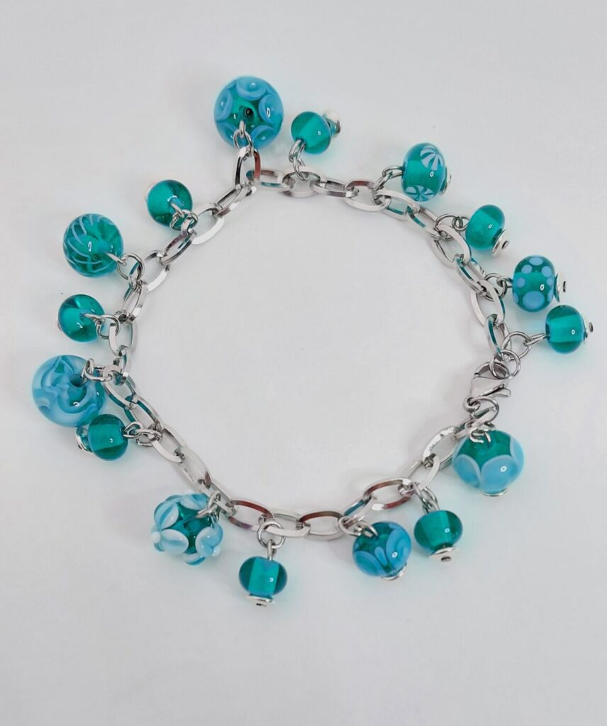 Bedelarmband turquoise. €30,-
